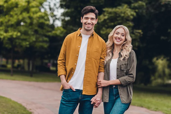 Portrait of attractive careful cheerful couple life partners meeting on fresh air spending daydream time outdoors — Zdjęcie stockowe