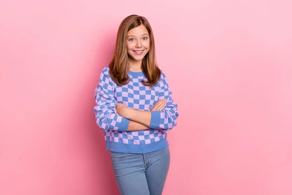Photo of blond optimistic teenager girl crossed arms wear plaid sweater isolated on pink color background — Stock Photo, Image