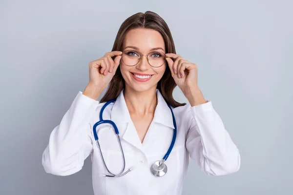 Photo of young attractive woman physician wear eyeglasses smart confident isolated over grey color background — Stockfoto