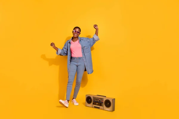 Full body portrait of attractive carefree girl enjoy discotheque good mood isolated on yellow color background — ストック写真
