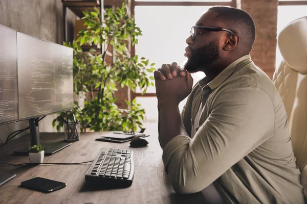 Profile side view portrait of attractive focused guy tech leader analyzing html css at workplace workstation indoors — Stock Fotó