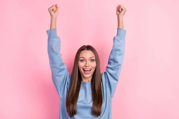 Portrait of attractive lucky cheerful girl having fun rejoicing great news isolated over pink pastel color background — Fotografia de Stock