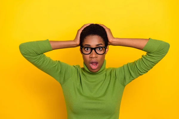 Photo of shocked impressed short hair lady dressed green turtleneck hands arms head isolated yellow color background — Stok fotoğraf