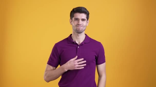 Guy advertise point himself great choose isolated bright color background — Stock Video