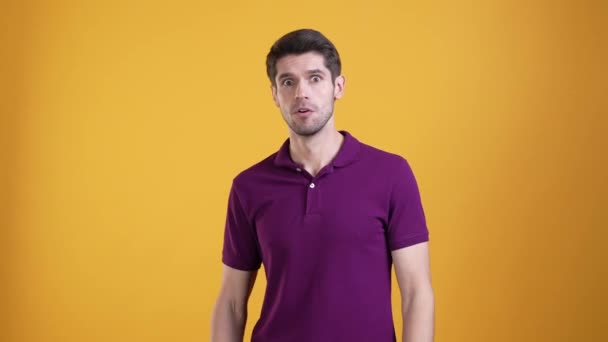 Guy hold neck killing himself isolated bright color background — Video Stock