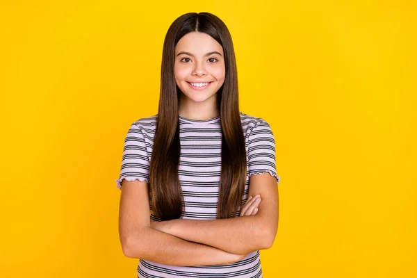 Portrait of attractive cheerful content long-haired girl folded arms isolated over bright yellow color background — Fotografia de Stock