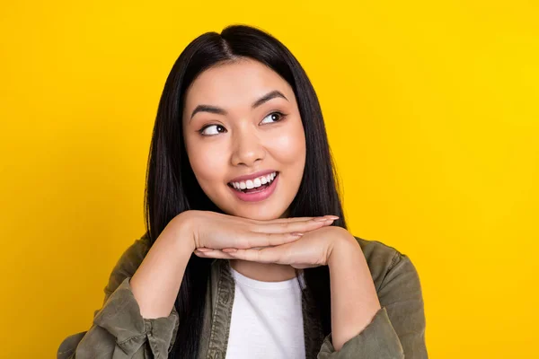 Close-up photo of cute adorable young woman look blank space daydreaming isolated on yellow color background — Stok fotoğraf