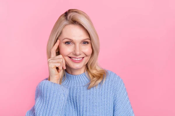 Photo of mature smart blond lady finger head wear blue pullover isolated on pink color background — Foto de Stock