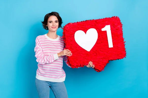 Photo of beautiful lady hold big red paper like button social media influencer isolated on vivid blue color background — Fotografia de Stock