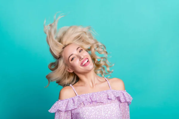 Photo of dreamy shiny lady wear violet blouse arms air blowing smiling isolated turquoise color background — Stock Photo, Image