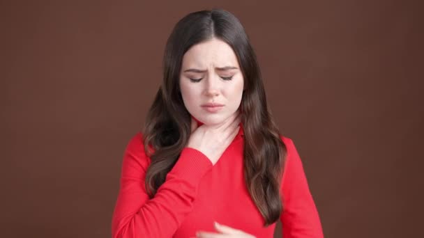 Frustrated lady suffer sore throat isolated brown color background — Video Stock
