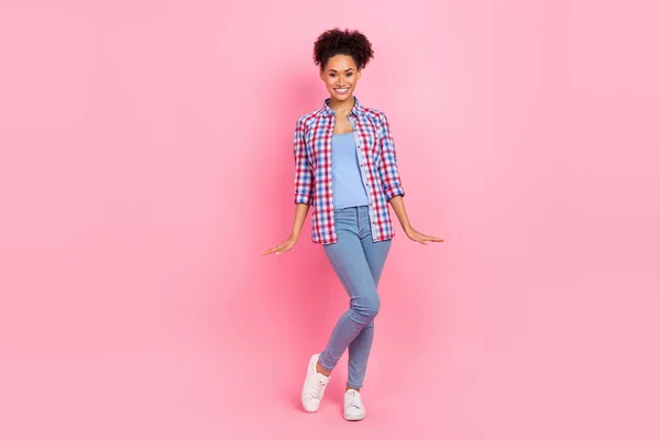 Full length body size view of attractive cheerful thin wavy-haired girl posing wear checked shirt isolated over pink pastel color background — Fotografia de Stock