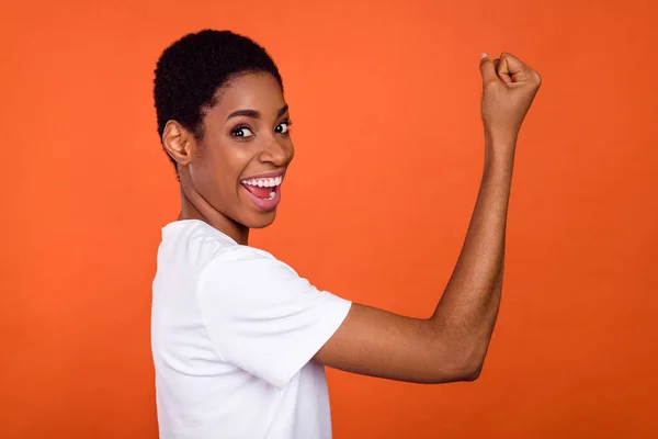 Profile side photo of transgender woman fist up celebrate scream wear t-shirt isolated bright color background — Fotografia de Stock