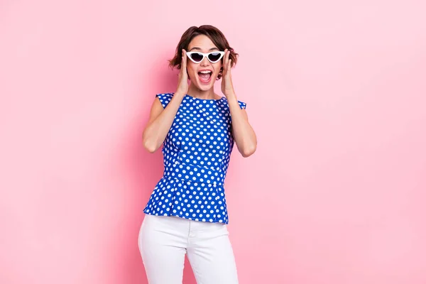 Photo of impressed young brunette lady dance wear glasses blouse jeans isolated on pink color background — Stok fotoğraf