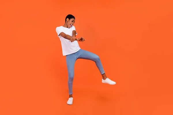 Full size photo of energetic stylish trendy androgyne lady dance hip hop isolated bright color background — Stok fotoğraf