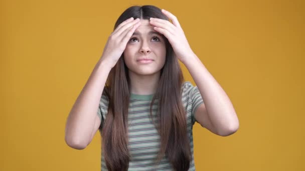 Teen girl upset see pimples cheeks isolated shine color background — Video Stock