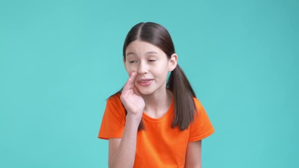 Schoolkid share privacy news ask keep silent isolated cyan color background — Stockvideo