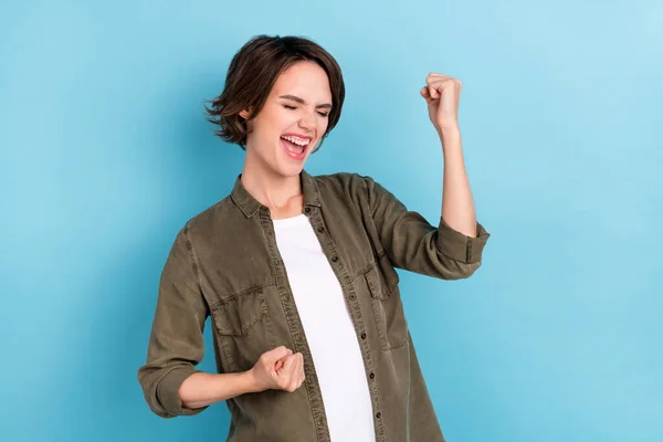 Photo of cool millennial short hairstyle lady yell hands fists wear trend cloth isolated on blue color background — Stockfoto