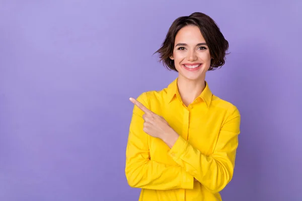 Photo of cute young bob hairdo lady index promo wear yellow blouse isolated on violet color background — Fotografia de Stock