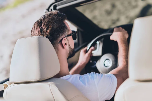 Photo of handsome cute boyfriend dressed casual outfit sunglass driving cabriolet outdoors countryside — Foto Stock