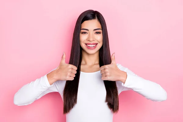 Photo of cute millennial brunette lady thumb up wear trend cloth isolated on pink color background — Stock fotografie