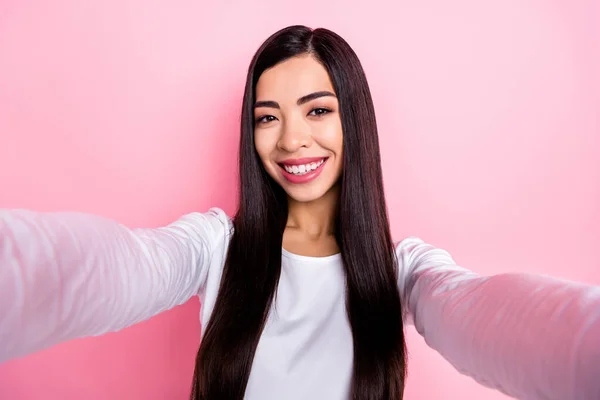 Photo of nice millennial brunette lady do selfie wear white shirt isolated on pink color background — Stockfoto