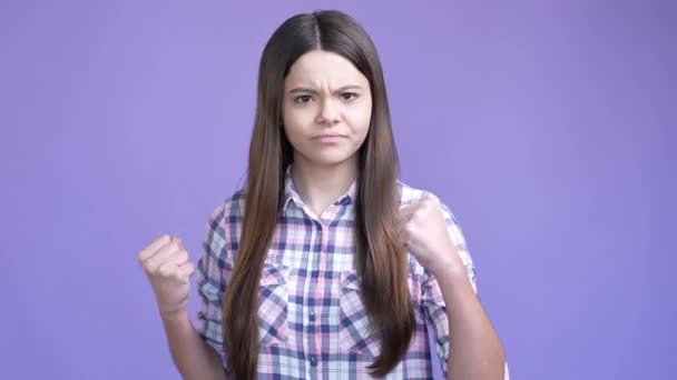 Little schoolchild fighter demonstrate triceps isolated shine color background — 비디오