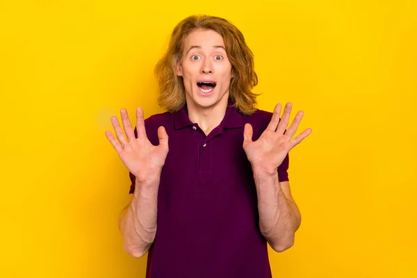 Portrait of shocked young person raise opened arms open mouth look camera isolated on yellow color background — Stockfoto