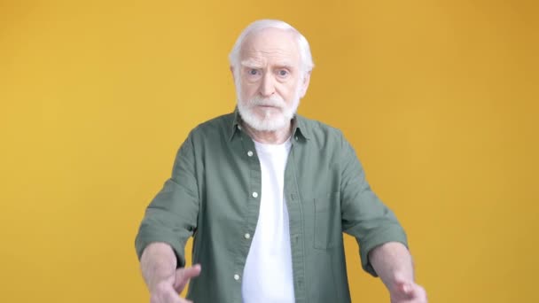 Aged man make thumb down symbol rate bad isolated bright color background — Video Stock