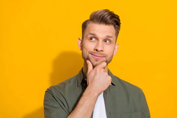 Portrait of attractive bewildered blond guy overthinking solution copy space isolated over bright yellow color background — Stock Fotó