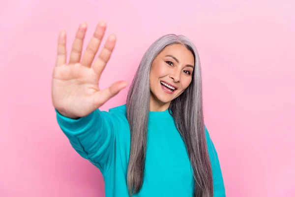 Portrait of satisfied person toothy smile arm palm give you high five isolated on pink color background — 스톡 사진