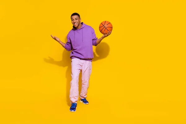 Full length body size view of attractive cheerful cool funny guy playing basketball isolated over vivid yellow color background — 스톡 사진