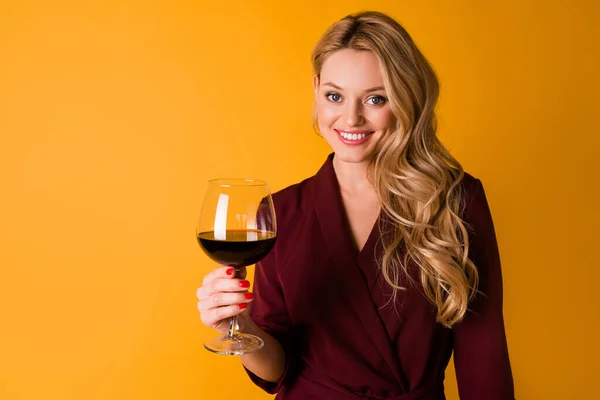 Photo of stunning charming woman wear red outfit holding wineglass empty space isolated yellow color background — Foto de Stock