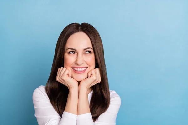 Photo of cute young brunette lady look promo wear white pullover isolated on blue color background — ストック写真