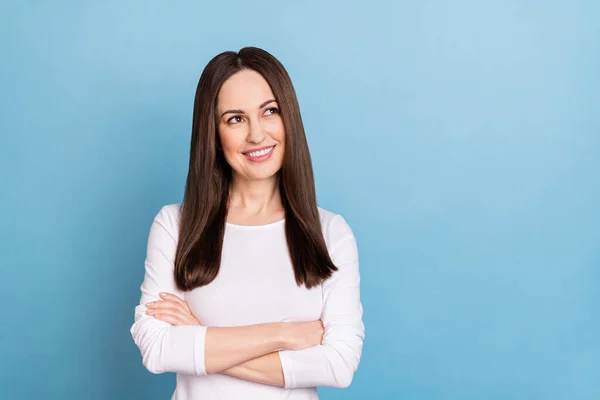 Photo of nice young brunette lady crossed palms look promo wear white pullover isolated on blue color background — 스톡 사진