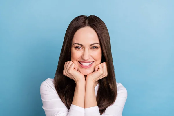 Photo of funny millennial brunette lady hands face wear white pullover isolated on blue color background — Stockfoto