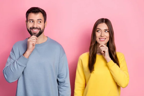 Portrait of attractive cheery couple deciding new strategy thinking isolated over pink pastel color background —  Fotos de Stock