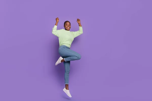 Full body image of good mood laughing lady raise hands up in triumph celebrate achievement isolated on violet color background — 图库照片