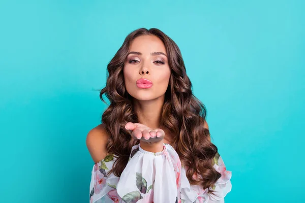 Portrait of pretty lovely wavy hairdo girl arm palm send air kiss you isolated on turquoise color background —  Fotos de Stock