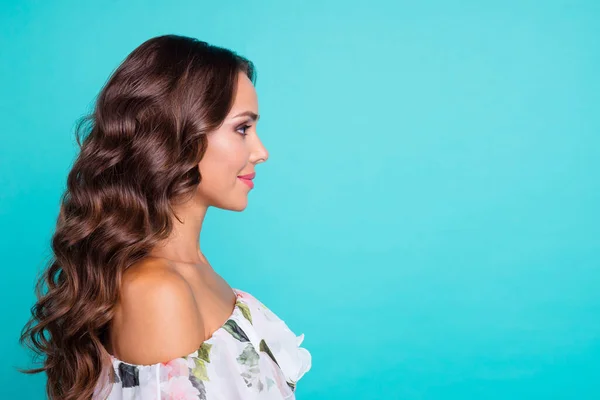 Profile photo of pretty positive wavy hairstyle person look empty space ad isolated on teal color background — Stockfoto