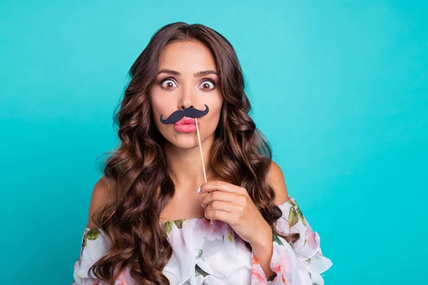 Photo of cute impressed lady dressed off shoulders holding fake mustaches pouted lips empty space isolated teal color background — 스톡 사진
