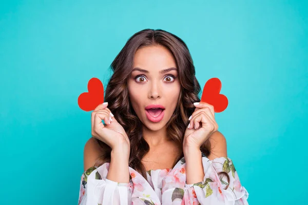 Photo of excited impressed woman wear flower print dress rising heart postcards open mouth isolated aquamarine color background — Foto de Stock