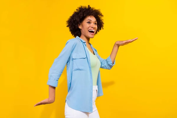 Photo of crazy energetic active lady dance disco have fun wear denim shirt isolated yellow color background — ストック写真