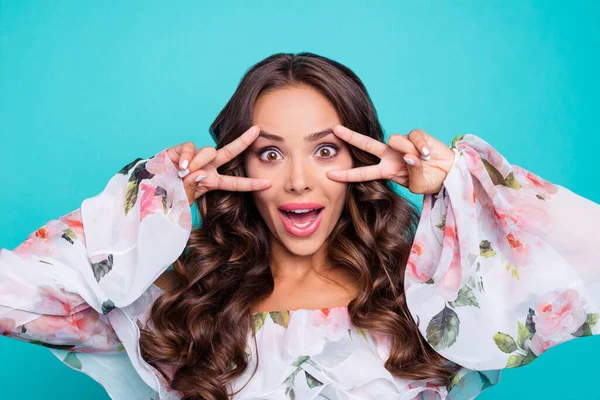 Portrait of pretty positive wavy hairdo girl hands fingers show v-sign near eyes isolated on turquoise color background —  Fotos de Stock