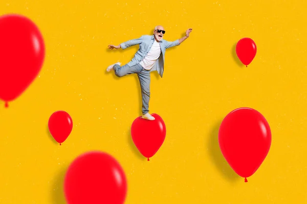 Full body collage photo of cute energetic grandpa feel young jumping on flying baloons isolated on yellow color background — Stock fotografie