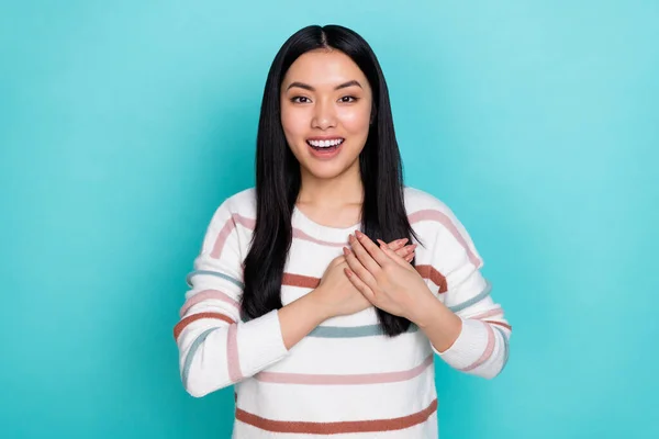 Photo of impressed young lady hands heart wear striped sweater isolated on turquoise color background — Stockfoto