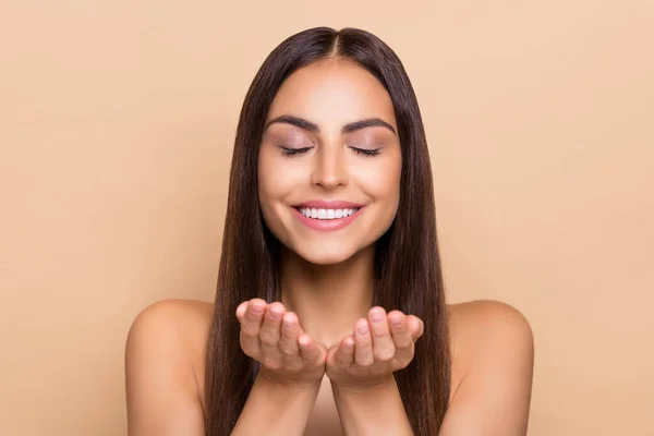 Photo of joyful lady hold hands wash face fresh pure water splash isolated on pastel color background —  Fotos de Stock