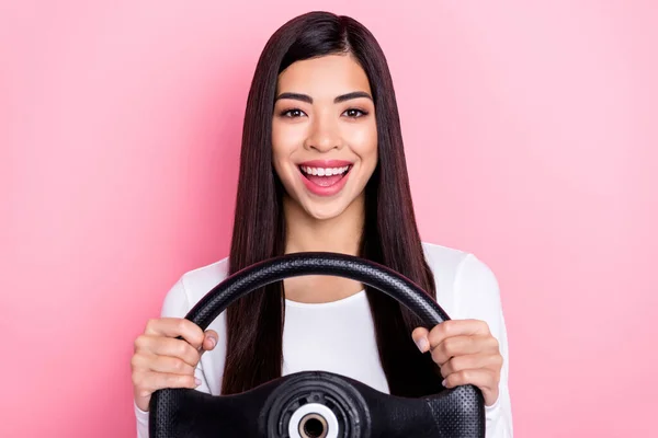 Photo of impressed millennial brunette lady drive car wear white shirt isolated on pink color background — Stockfoto