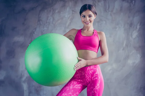 Photo of sportive lady sportsman blogger hold fit ball talk web camera exercise aerobics in modern loft — Stockfoto
