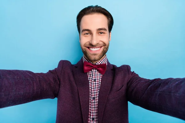 Photo of young cheerful man make take selfie influencer photographer isolated over blue color background — Φωτογραφία Αρχείου